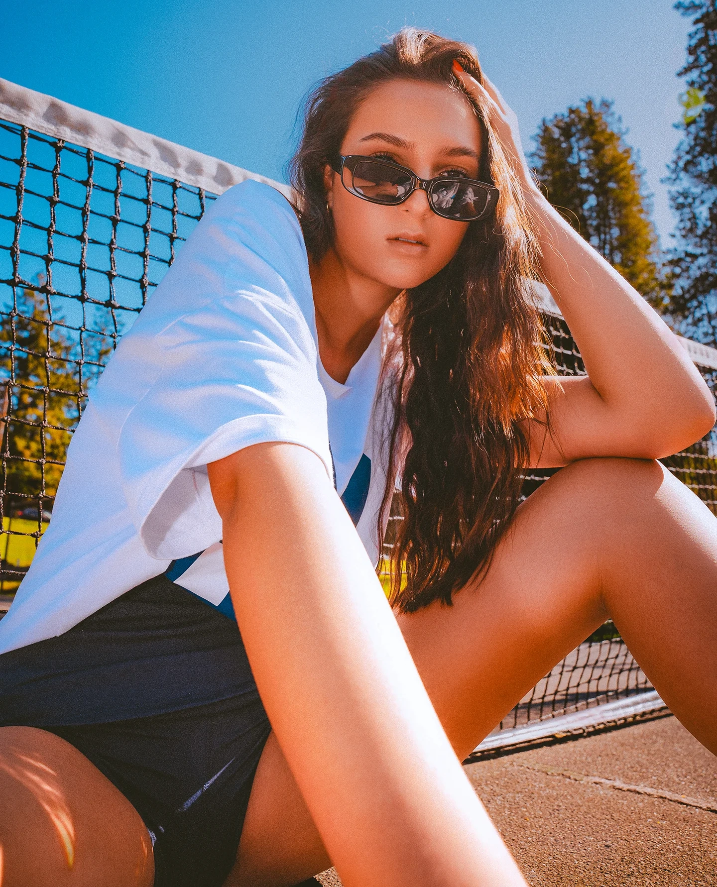Match Point editorial cover portrait of Daniela on a tennis court