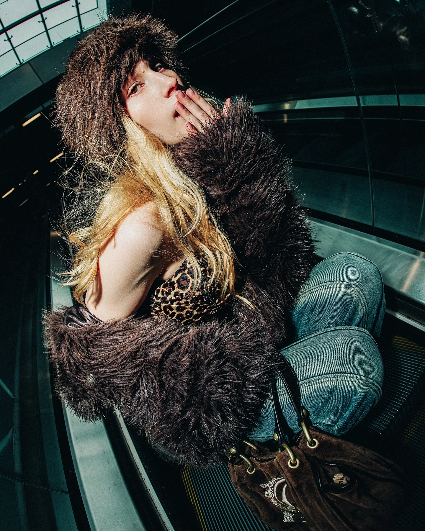 Urban fashion portrait of Kolbi with downtown Vancouver backdrop