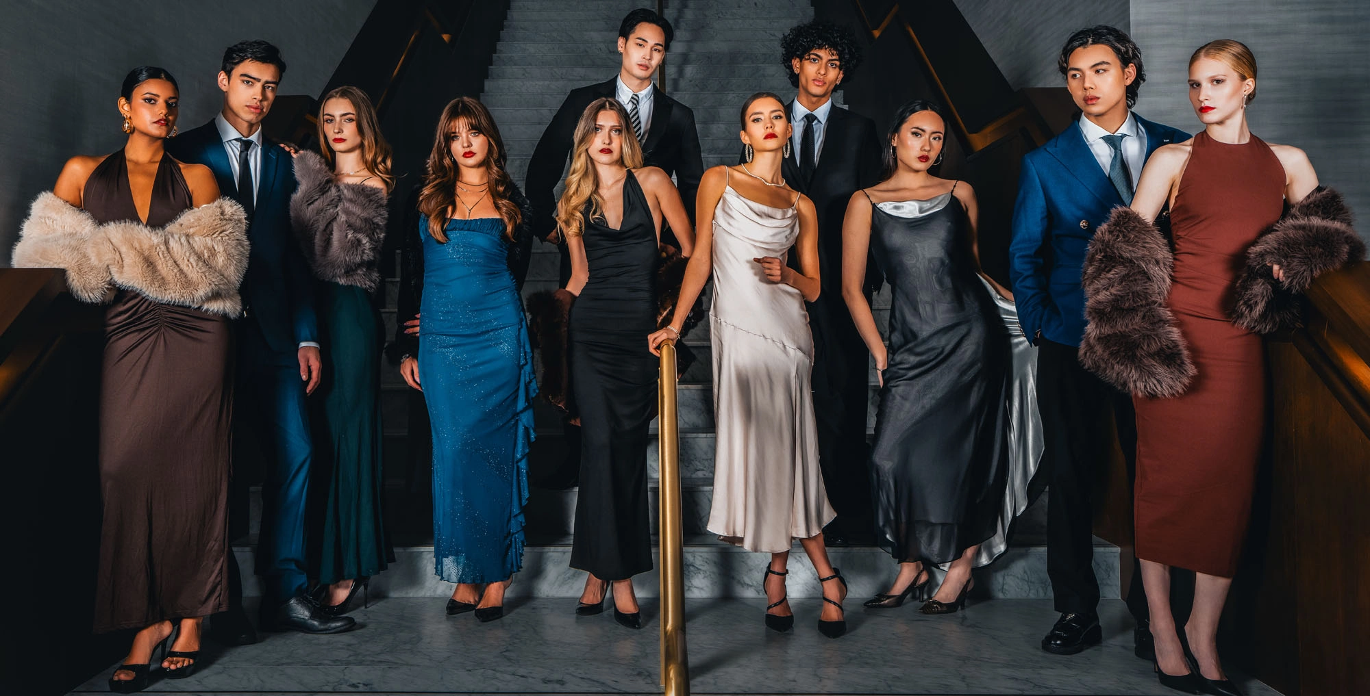 Group fashion portrait featuring all 11 models at Arras Vancouver