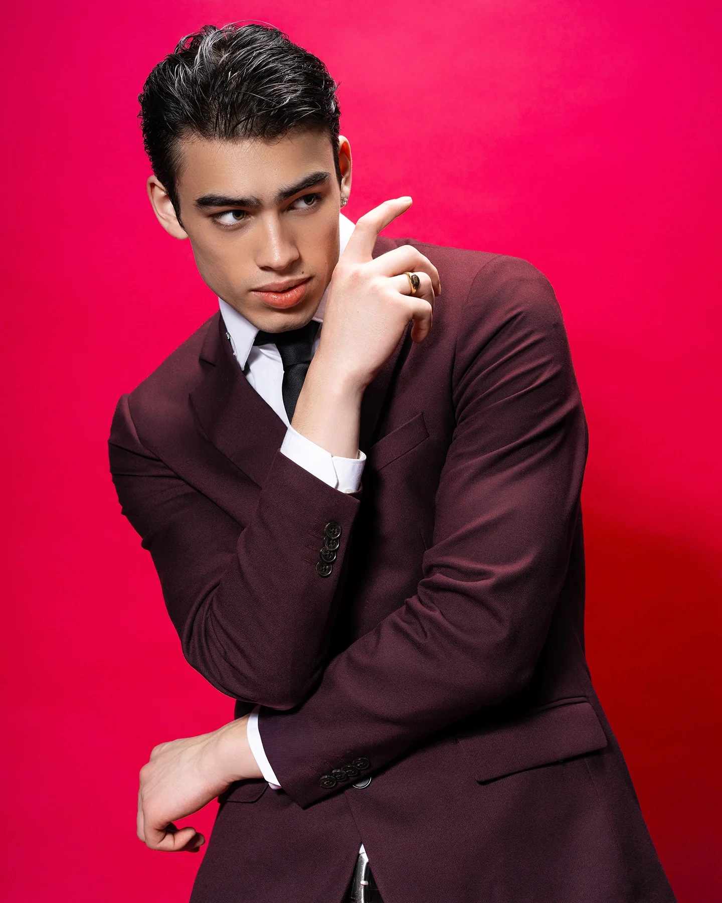 Tenet editorial portrait emphasizing the red color theme