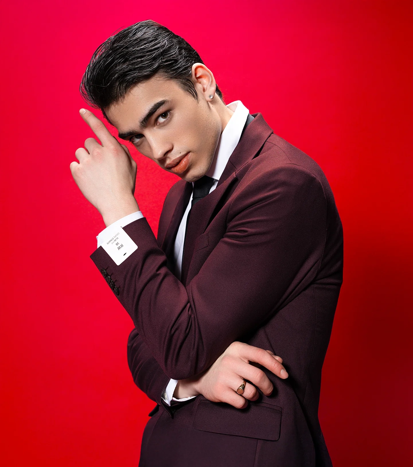 Closing portrait of Kai from the red backdrop editorial series