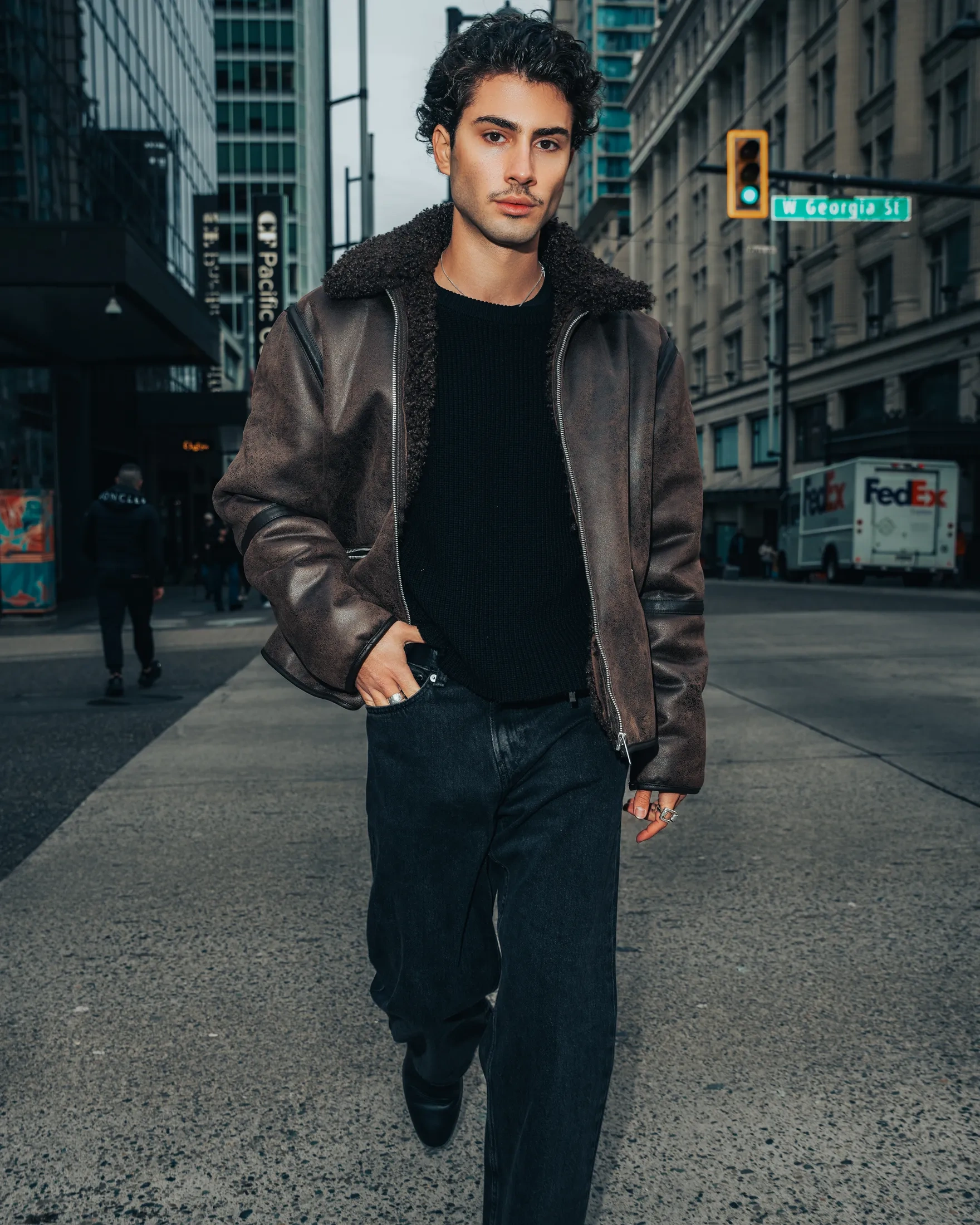 Mario street-style editorial portrait with urban city backdrop