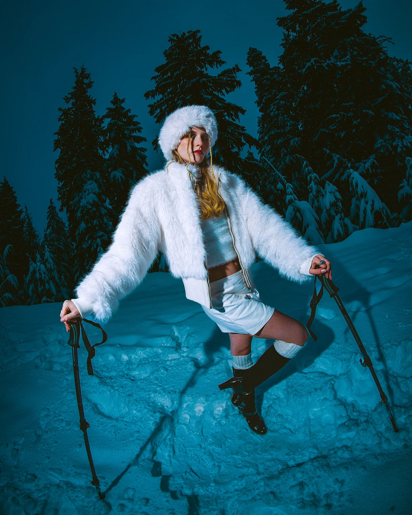 Fashion portrait of model Kolbi on snow-covered Vancouver mountain