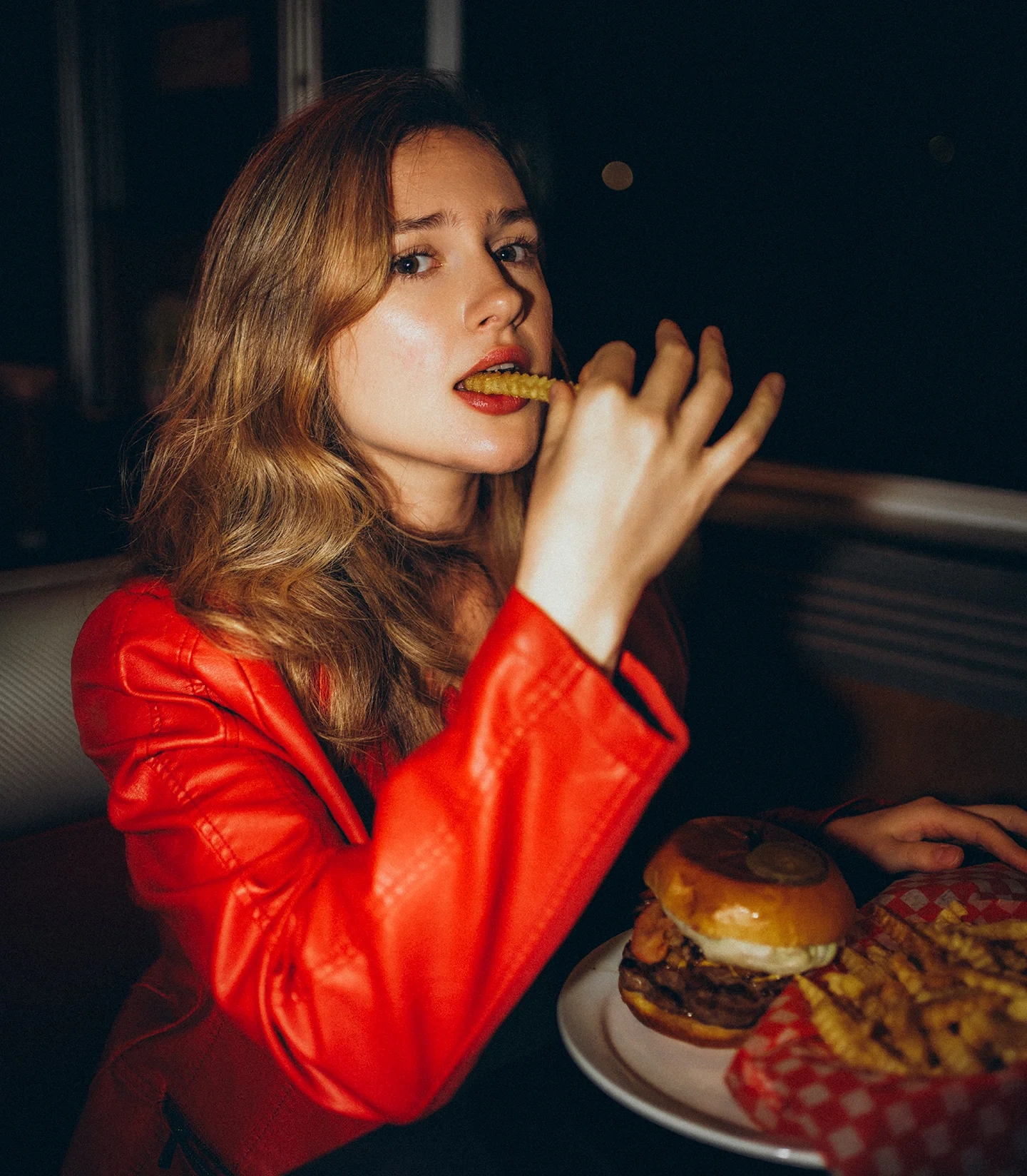 Fashion portrait of model Lizzie inside a diner