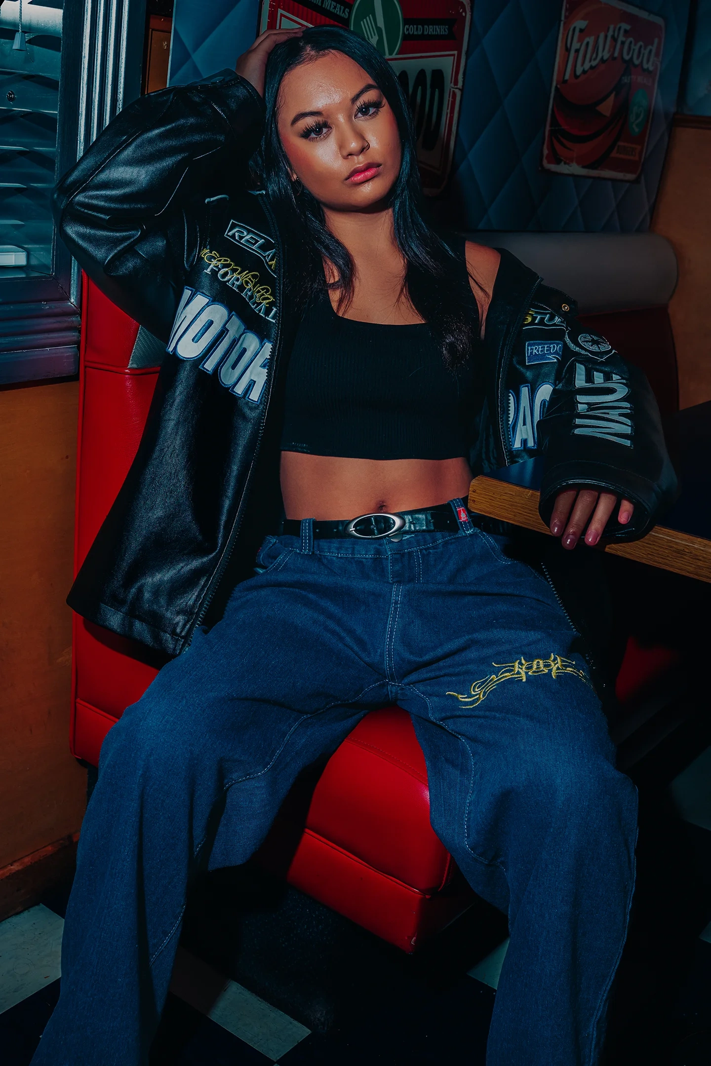 Fashion portrait of model Rachelle inside a retro diner