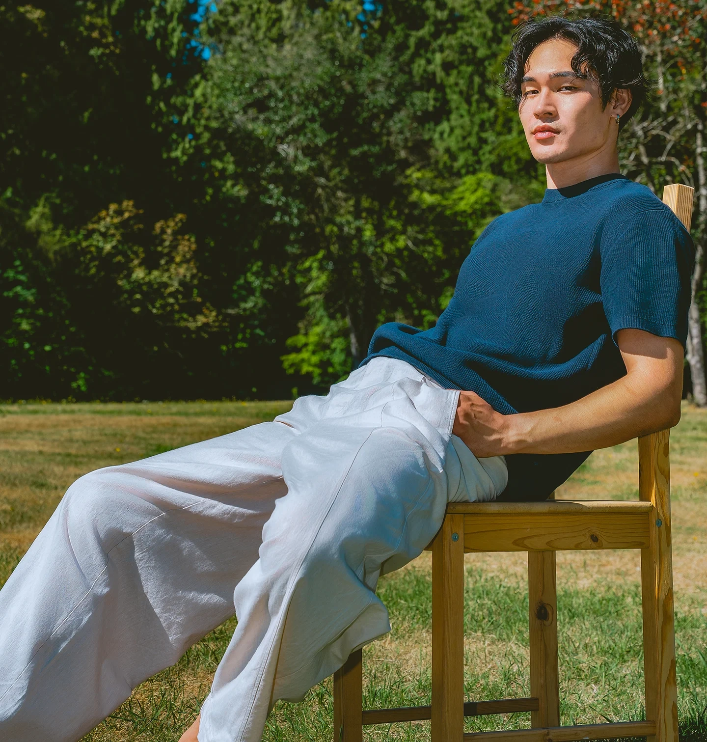 Koki portrait in sunny outdoor environment with natural background