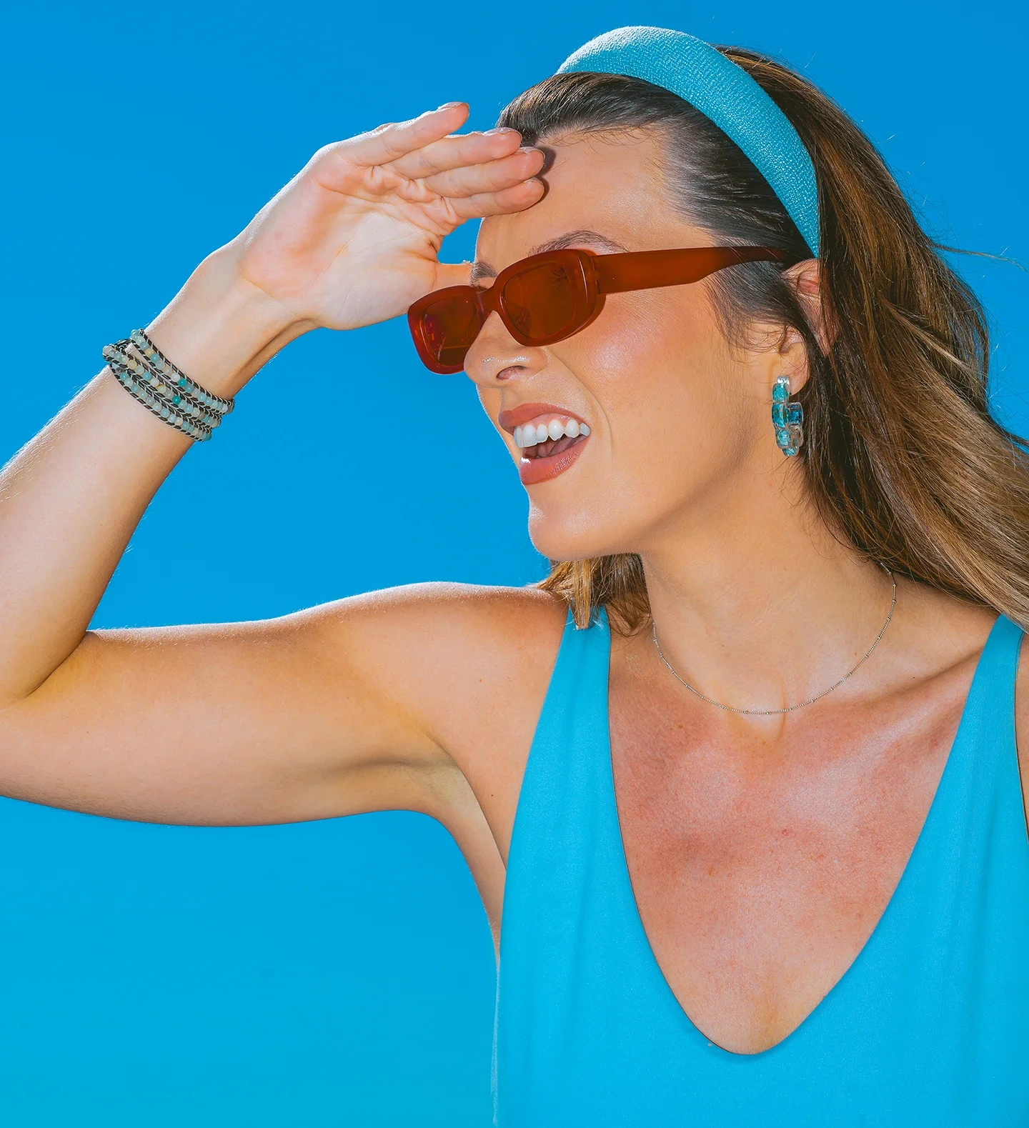 Natural light fashion portrait of Melissa by the ocean