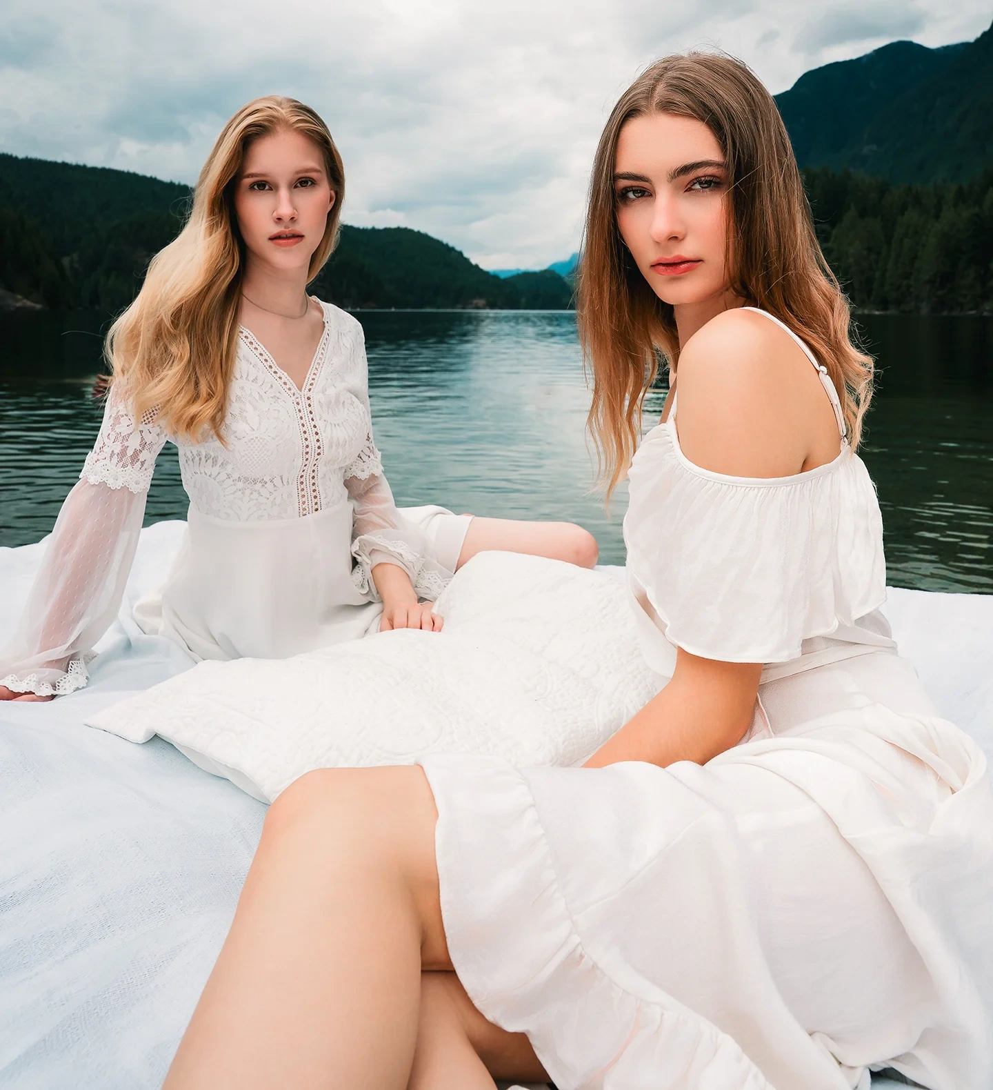 Duo editorial portrait of Michaela and Kolbi with tree-lined background