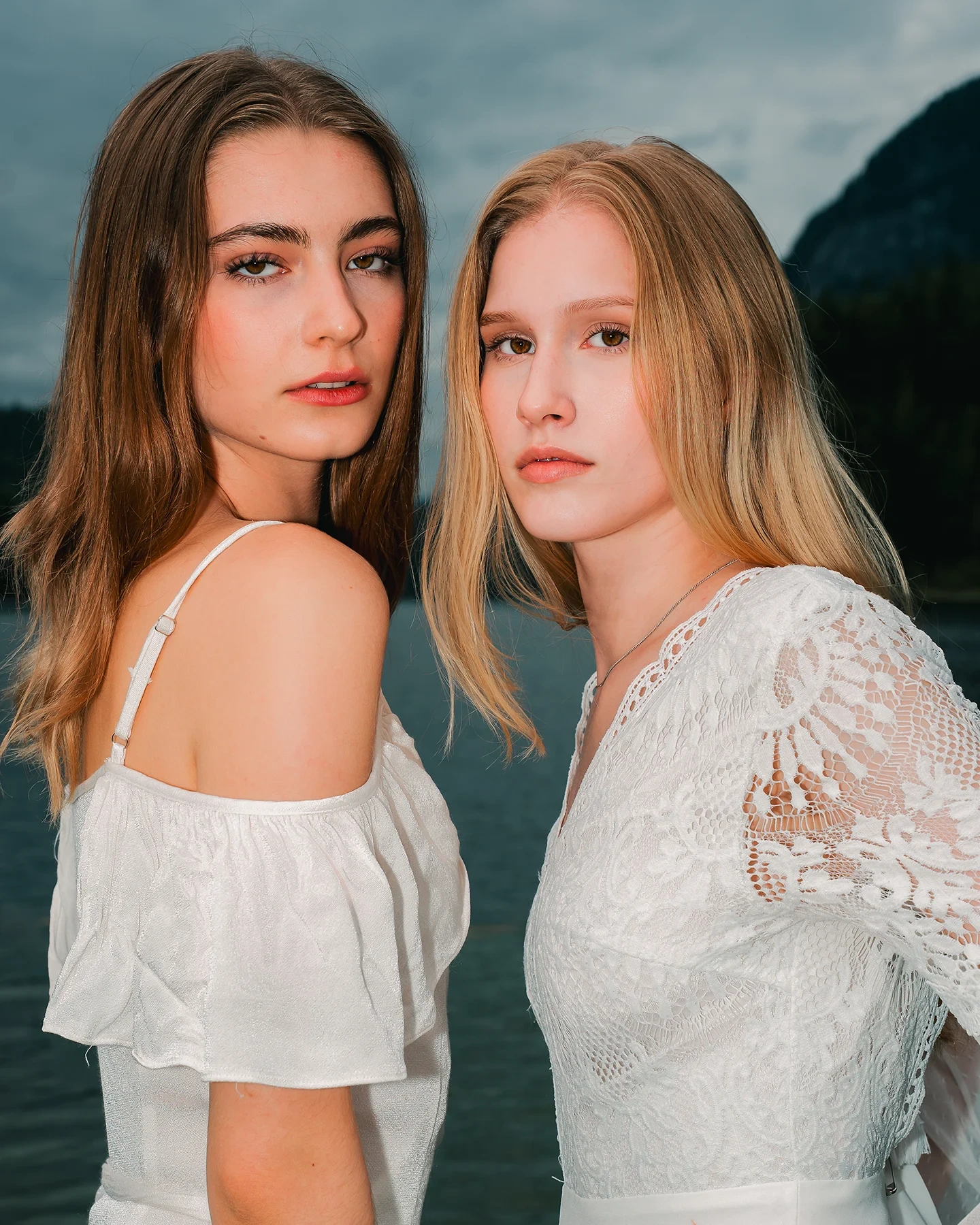 Duo fashion portrait of Michaela and Kolbi in tree-lined location